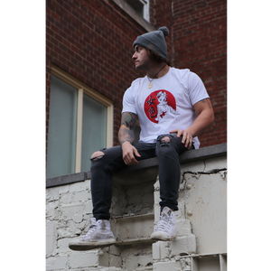 Male model wearing Mikan Geisha shirt sitting on wall facing away from camera in size large