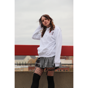 Female model wearing Mikan Geisha hoodie in skirt
