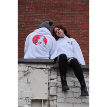 Load image into Gallery viewer, Female and male model wearing Mikan Geisha hoodie sitting on a wall together
